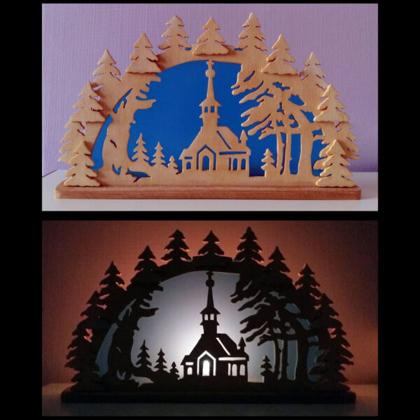 Paesaggio natalizio in legno che si illumina con candela retrostante